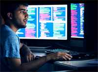 Man at computer.
