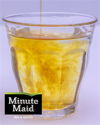 Minute Maid logo and glass of water with orange syrup pouring into it.