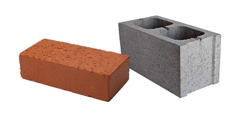 Photographs of a brick and a cinder block both created by humans and therefore not considered a rock.