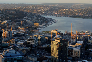 aerial photograph of the Seattle skyline showing residential towers and waterfront