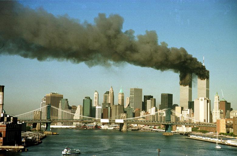 New York City Skyline with the Twin Towers billowing smoke