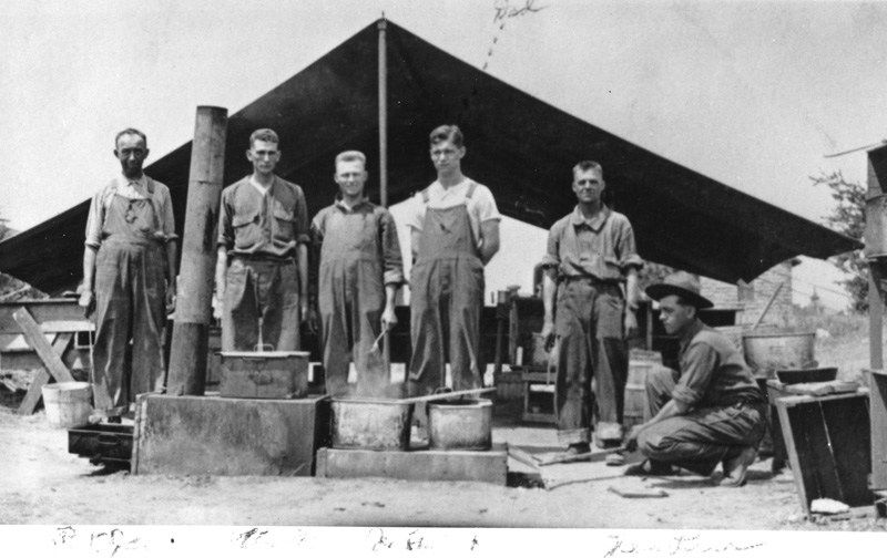 Six Conscientious Objectors standing in front of tent in Camp Funston, Kansas, circa 1918