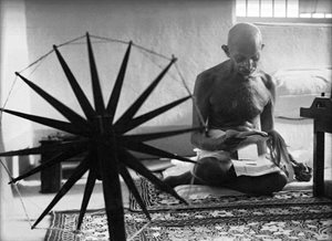 Gandhi with his spinning wheel