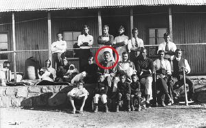 Photo of members of the Tolstoy Farm in South Africa, with Gandhi, centre photo, indicated by a red circle