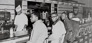 Men sitting at lunch counter in Greensboro, South Carolina