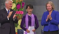 Aung San Suu Kyi with Thorbjørn Jagland and Kaci Kullman Five