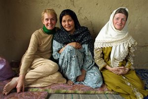 Three women: two members of Peaceful Tomorrows with a local Afghan woman.