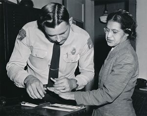 Rosa Parks being fingerprinted